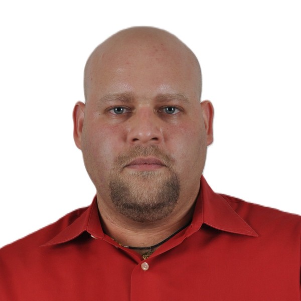 Neutral expression, both eyes open, facing the camera.