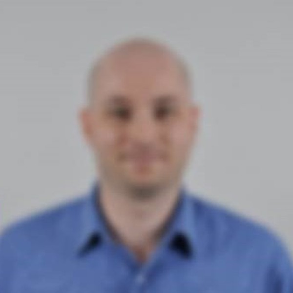 The image is blurry and the face is not clearly visible.